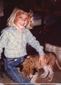 Dayna with lion cub